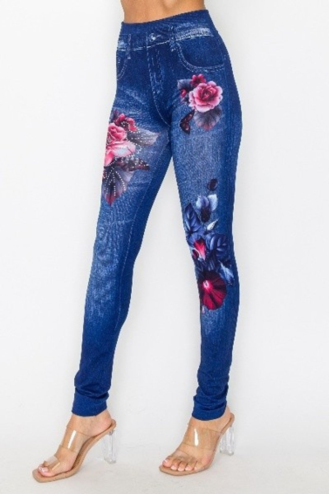 Blue jeans look with floral designs on a white background